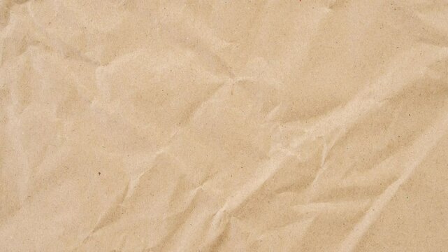 Abstract crumpled and creased recycle brown paper texture background stop motion