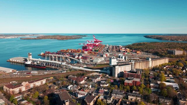 Drone footage showcasing PSA Halifax Atlantic Hub with container vessels, cranes, and port activity in Halifax, Nova Scotia