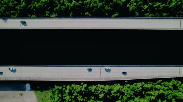 Dynamic top-down drone view of I-55 twin highways near LaPlace, Louisiana&mdash;ideal for transport logistics and infrastructure B-roll.