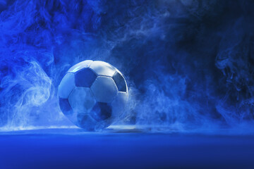 soccer ball in textured neon smoke - creative soccer concept