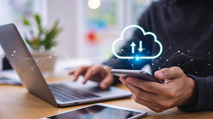Cloud storage and data transfer concept using mobile phone and laptop connection
