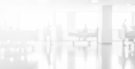 Naklejka premium Bright white office interior with desks chairs and large windows.