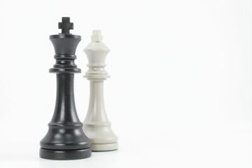 Black wooden chess king isolated on white