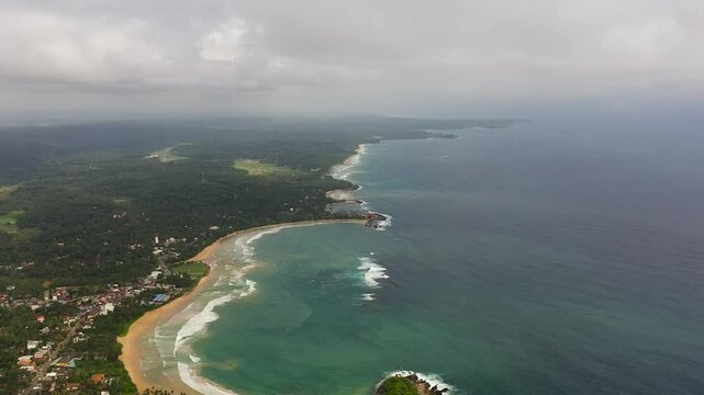 Aerial drone of hotels and Dickwella Beach, Sri Lanka.
