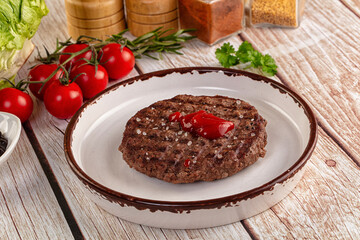 Grilled juicy beef cutlet for burger
