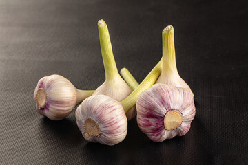 Raw young garlic bulb heap