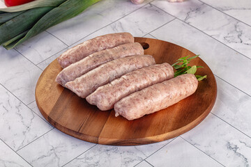Raw pork sausages for grill