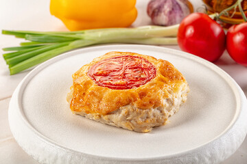 Chicken chop cutlet with cheese and tomato