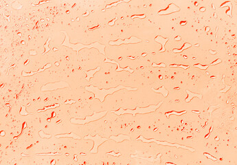 Abstract water drops on orange background, orange water drops pattern background