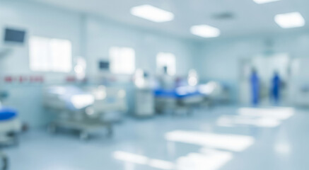 Blurred hospital room with beds and medical equipment in a bright setting.