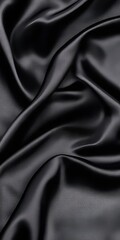 Obraz premium Dark Elegance Unveiled A Captivating Black Fabric Drapes Sensuously, Exuding Luxury and Style