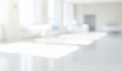 Blurred white interior with tables and equipment suggests a clean medical environment.