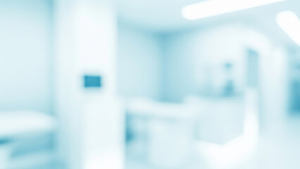 Blurred hospital interior with medical equipment and light blue tones.
