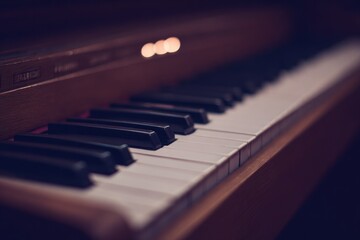 vintage organ keyboard with subtle lighting highlights keys against dark background