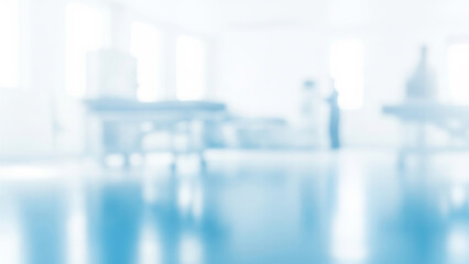 Blurred interior view of a bright clean room with medical equipment.
