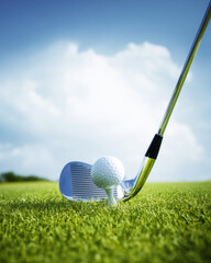 Golf Club and Ball on Tee with Blue Sky in Outdoor Course Close-Up