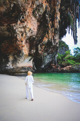 happy woman stand on the beach at krabi province, Thailand. soft focus