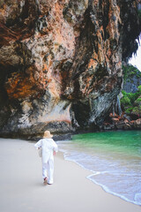 happy woman stand on the beach at krabi province, Thailand. soft focus