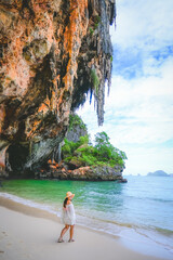 happy woman stand on the beach at krabi province, Thailand. soft focus