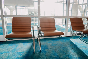 waiting area seat at airport. subject is blurred and low key