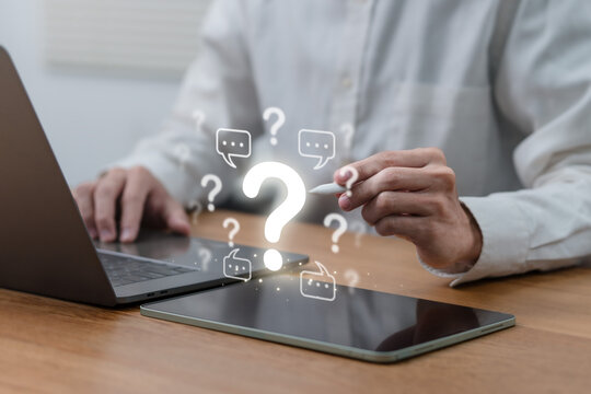 Man hand pointing question mark sign for QA, Question and Answer. FAQ, frequently asked questions. copy space. Instructions and rules. Information, Communication Concepts on digital platform.