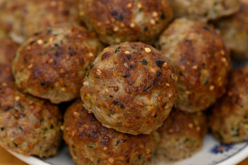 Minced pork cutlets with onion, egg and buckwheat close-up, meatballs