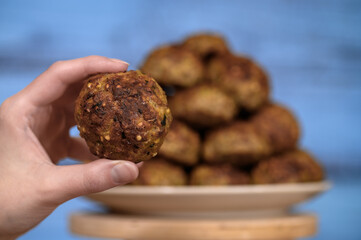 Buckwheat and meat cutlets on a blue background, delicious home cooking from grandma's recipe