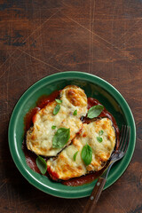  eggplant parmigiana with tomato sauce in