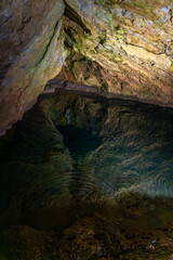 transparent pond in the cave