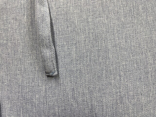 Fabric texture with a seam of gray color. Background and texture.