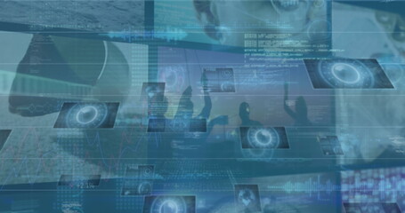 Celebrating team raising arms at virtual data hub, holographic screens showing charts and code