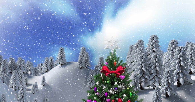 Fototapeta Standing Christmas tree with multicolored ornaments and star topper on snowy hills, winter scene