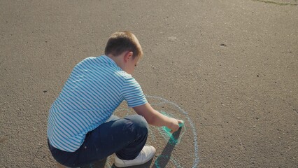 Clean planet Earth, boy child draws chalk asphalt, Kid child baby boy, Future of Planet in Children...