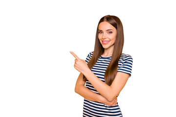 Photo of friendly lady indicating finger empty space on low prices wear striped t-shirt isolated yellow background