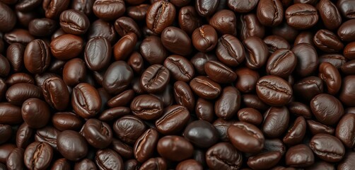 Obraz premium Close-up of dark roasted coffee beans, oily sheen, irregular shapes, crop, photography