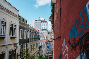 Urban Street View in Lisbon with Graffiti and Colorful Architecture