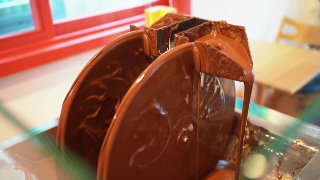 Chocolate mixing container in conching machine for smooth production, Stainless steel vessel blending cocoa in chocolate manufacturing process