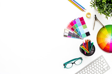 Decorator workspace flat lay. Creative designers table with color paint swatches