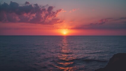 Sunset At Sea with variety of colors and hues of the rising sun, showcasing a sea landscape.