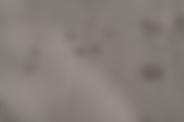 blurred gray uneven background with spots
