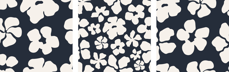 Seamless pattern set featuring bold floral and botanical silhouettes in navy on a light cream background. Hand-drawn modern design perfect for textiles, packaging, wallpaper, and digital projects.