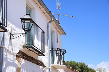 Narrow street with old beautiful houses in Alcaraz town
