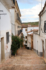 Narrow street with old beautiful houses in Alcaraz town