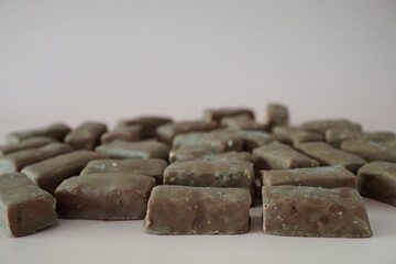 Chocolates on a pink background. Sweets.