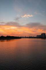 Naklejka premium sunset over the river