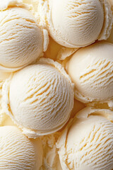 Close-up of creamy vanilla ice cream scoops with rich texture.