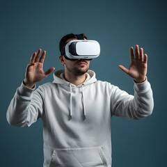 Man in white hoodie using virtual reality headset