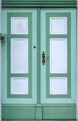 Green white wooden door. Old house entrance. Retro classic style