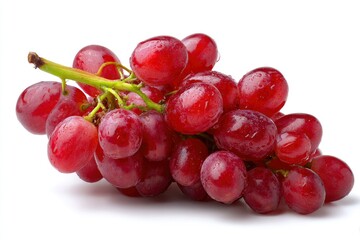 Fototapeta premium A cluster of red grapes each with visible water droplets attached to a green stem lies against a white backdrop