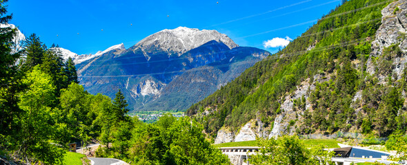 Lechtal Austria alpine mountain landscape panorama blue sky and snow.